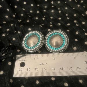 Artist made buffalo nickel earrings from Santa Fe, New Mexico.